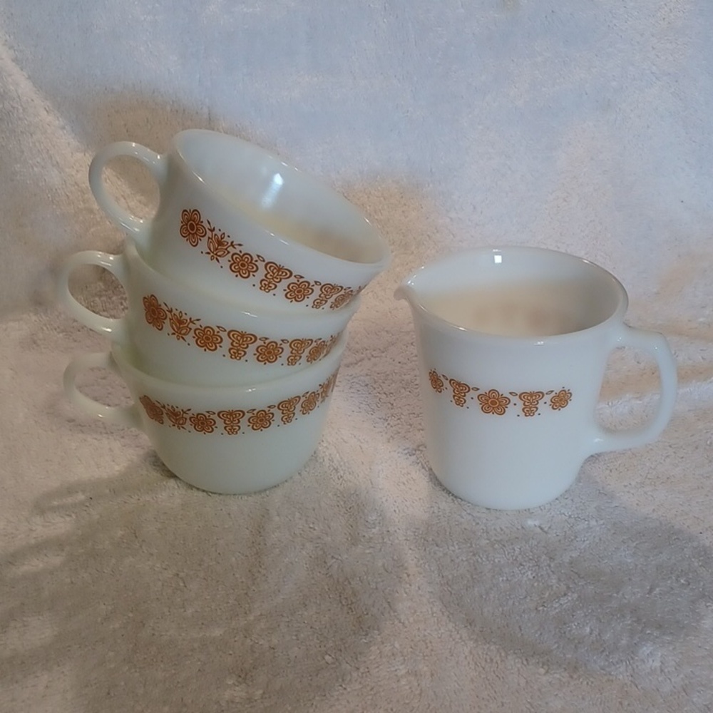 Pyrex cups and cream pitcher matches butterfly design corelle by Corning
